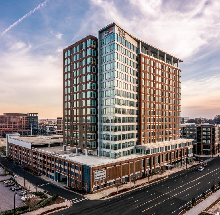 office building drone shot 768x751